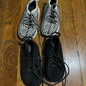 Toddler size 6 Yeezy sneaker. One black pair one cream pair.